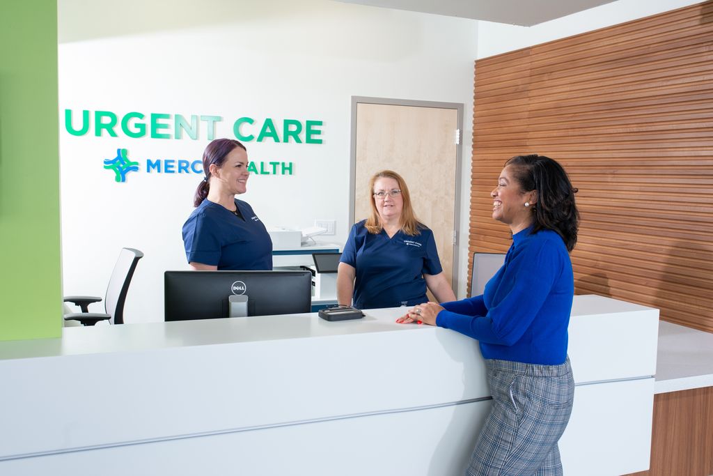individual checking in at Mercy Health Urgent Care